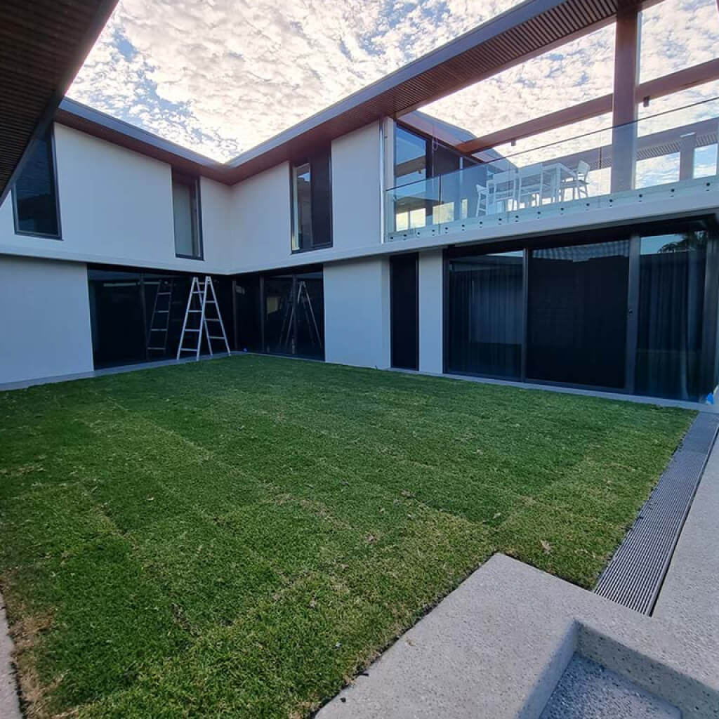 Before and After application of waterproof sealant on a roof garden top