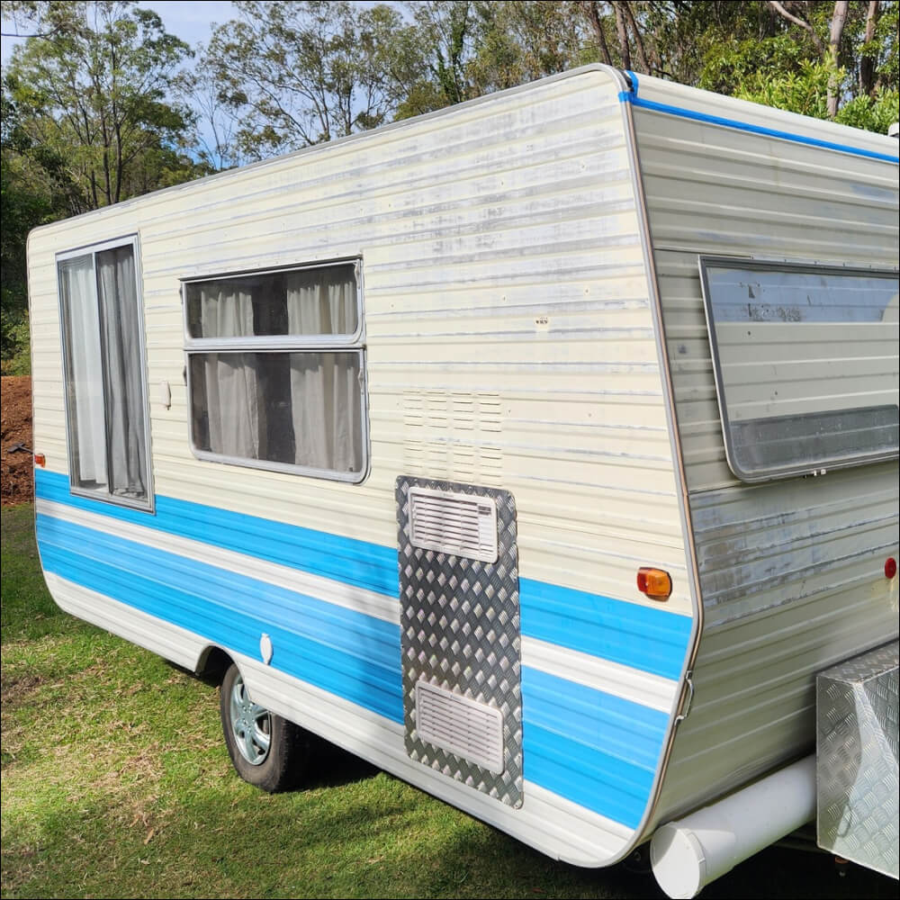 Before and After application of waterproof sealant on a caravan roof