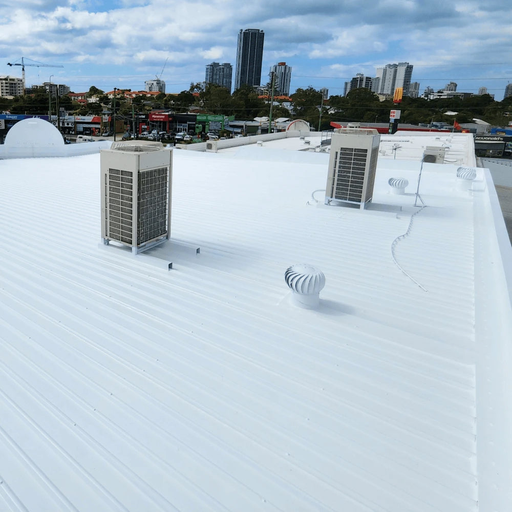 Before and After application of waterproof sealant on a rusty roof